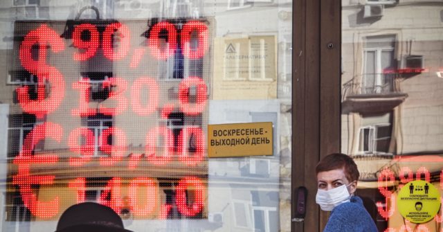 Ruble Hits Record Low As Russia Sanctions Take Hold