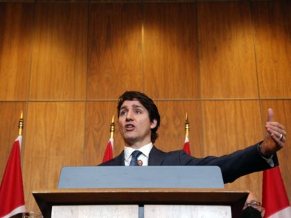 Canadian Prime Minister Justin Trudeau speaks during a news conference in Ottawa, Ontario, Canada, on February 21, 2022. - Trudeau on Monday defended his use of emergency powers to end weeks-long trucker-led protests and argued that lingering threats require the measures to remain in force for now. (Photo by DAVE …