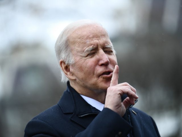 US President Joe Biden speaks to the press as he departs the White House in Washington, DC, on December 8, 2021. - Biden said Wednesday he had warned his Russian counterpart Vladmimir Putin of unprecedented US sanctions if Russia attacks Ukraine. A day after their virtual summit, Biden said he …