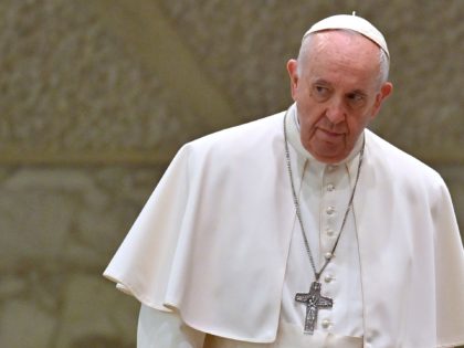 Pope Francis reacts during his weekly general audience in the Paul VI hall at the Vatican