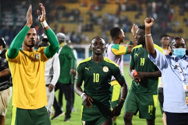 Sadio Mane celebrates Senegal's win over Equatorial Guinea in the quarter-finals on Sunday