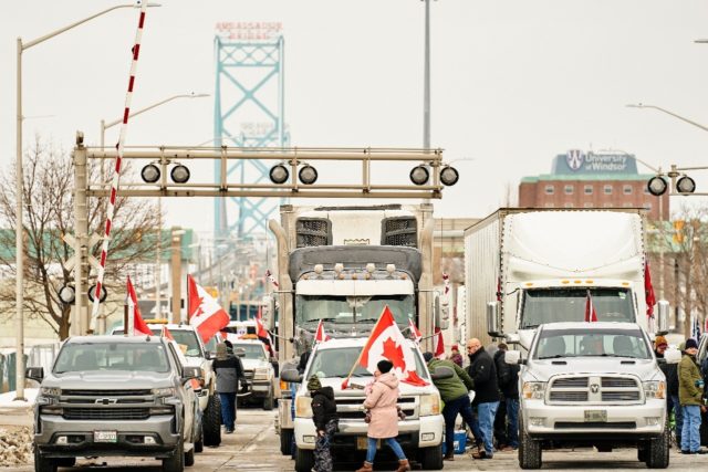 Supporters of a truckers convoy protesting against Covid-19 vaccine mandates blocked traff