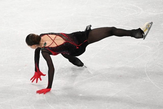 Russia's Kamila Valieva falls as she competes in the women's free skating