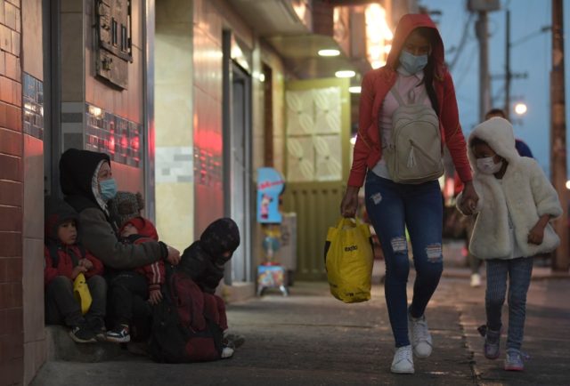 Heidy Garzon often has no choice but to beg on the street with her children for something