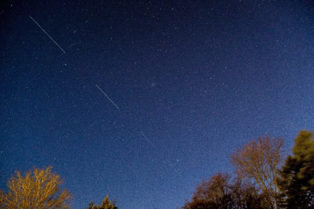 A SpaceX Starlink satellite is seen passing in the night sky in Denmark in April 2020