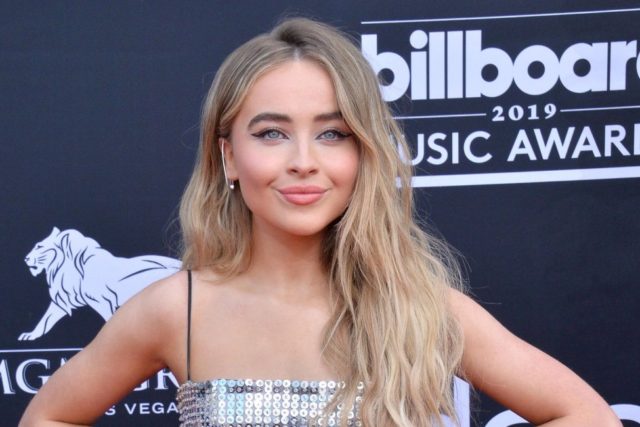 Sabrina Carpenter takes on bad guys in 'Fast Times' music video