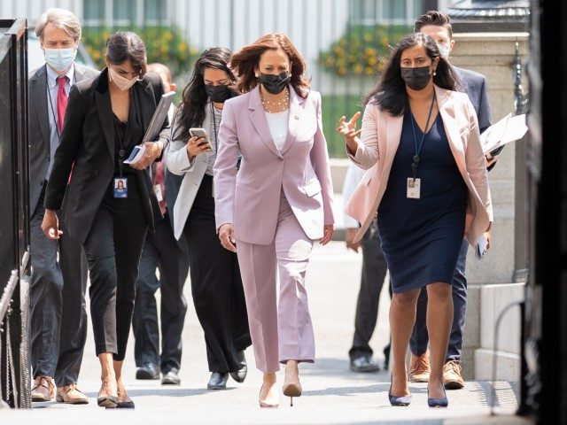 Vice President Kamala Harris walks with Deputy Press Secretary to the Vice President Sabri