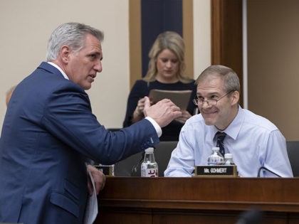 House Majority Leader Kevin McCarthy, R-Calif., left, talks with Rep. Jim Jordan, R-Ohio, before the House Judiciary Committee questions Google CEO Sundar Pichai about the internet giant's privacy security and data collection, on Capitol Hill in Washington, Tuesday, Dec. 11, 2018. McCarthy made an opening statement before Pichai appeared. (AP …