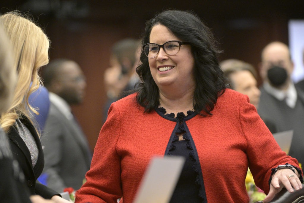 Florida Sen. Kelli Stargel mingles during a legislative session, Tuesday, Jan. 11, 2022, in Tallahassee, Fla. (AP Photo/Phelan M. Ebenhack)