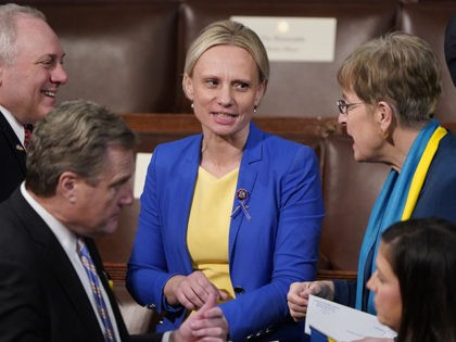 Rep. Steve Scalise, R-La., left, and Rep. Marcy Kaptur, D-Ohio, right, talk with Ukrainian-born American Rep. Victoria Spartz, R-Ind., before President Joe Biden delivers his first State of the Union address to a joint session of Congress, at the Capitol in Washington, Tuesday, March 1, 2022. (AP Photo/J. Scott Applewhite, …