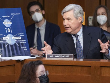 Sen. Sheldon Whitehouse, D-R.I., discusses "dark money" while speaking during the nomination hearing of Supreme Court nominee Ketanji Brown Jackson, Tuesday, March 22, 2022, to the Senate Judiciary Committee on Capitol Hill in Washington. (AP Photo/Jacquelyn Martin)