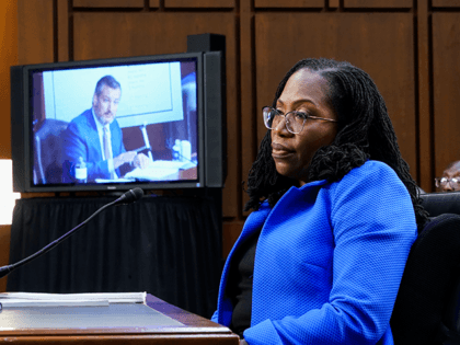 Supreme Court nomineeKetanji Brown Jackson listens as Sen. Ted Cruz, R-Texas, speaks durin