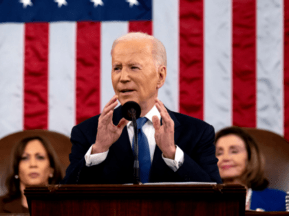 WASHINGTON, DC - MARCH 01: US President Joe Biden delivers the State of the Union address as U.S. Vice President Kamala Harris (L) and House Speaker Nancy Pelosi (D-CA) applaud during a joint session of Congress in the U.S. Capitol House Chamber on March 1, 2022 in Washington, DC. During …
