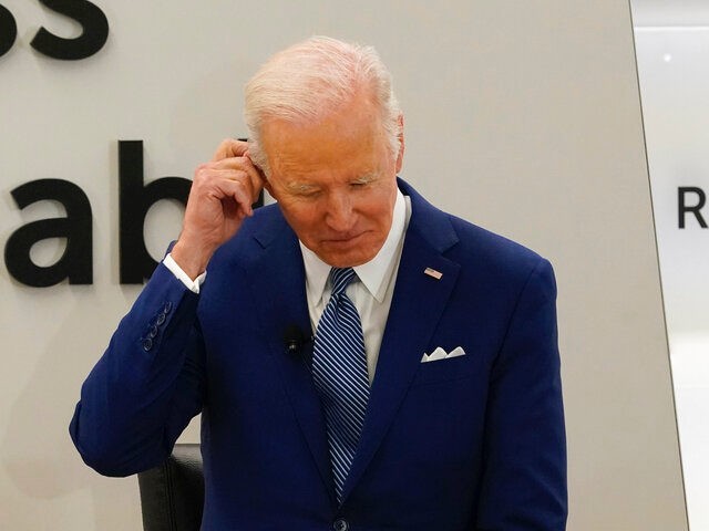 President Joe Biden waits to speak at Business Roundtable's CEO Quarterly Meeting, Monday, March 21, 2022, in Washington. (AP Photo/Patrick Semansky)