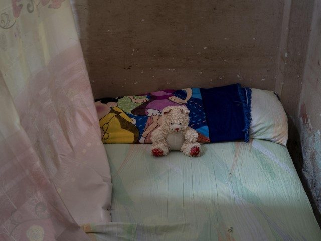 A teddy bear rests on the bed of Mackyanis Yosney Romam Rodriguez who is in prison along with her two brothers, accused of participating in the recent protests against the government, at their home in La Guinera neighborhood of Havana, Cuba, Wednesday, Jan. 19, 2022. Six months after surprising protests …