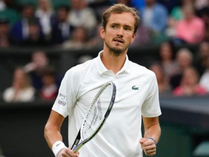Russia's Daniil Medvedev celebrates a point during the men's singles fourth round match against Poland's Hubert Hurkacz on day eight of the Wimbledon Tennis Championships in London, Tuesday, July 6, 2021. (AP Photo/Kirsty Wigglesworth)