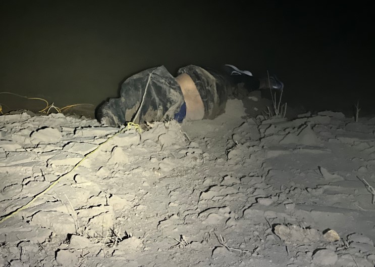 Border Patrol agents recover the body of a migrant who drowned in the Rio Grande near Eagle Pass in March. (U.S. Border Patrol/Del Rio Sector)
