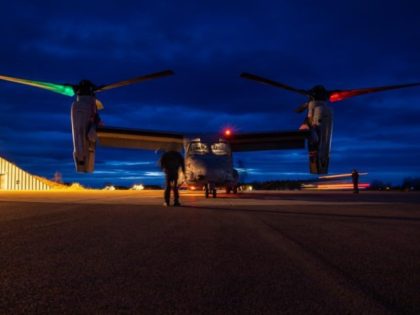 U.S. Marines inspect a MV-22B Osprey prior to flight at Norwegian Air Force Base Bodo duri