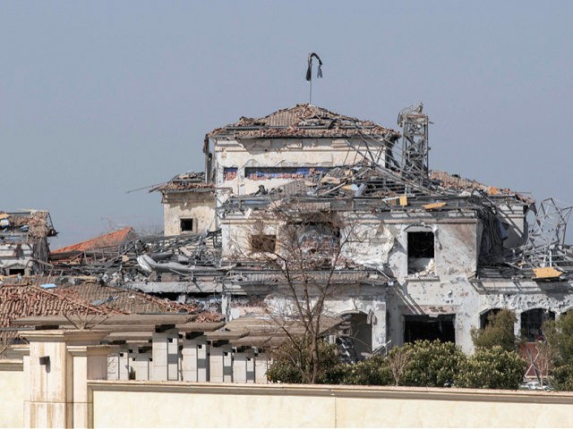A picture taken on March 13, 2022, shows a view of a damaged building after an overnight a