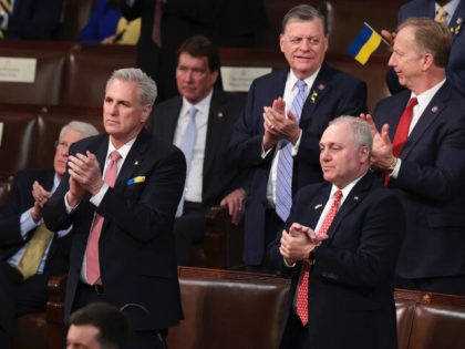 House Republicans, including House Minority Leader Kevin McCarthy, R-Calif., and Minority Whip Steve Scalise, R-La., stand and applaud as President Joe Biden delivers his State of the Union address to a joint session of Congress at the Capitol, Tuesday, March 1, 2022, in Washington. (Win McNamee, Pool via AP)