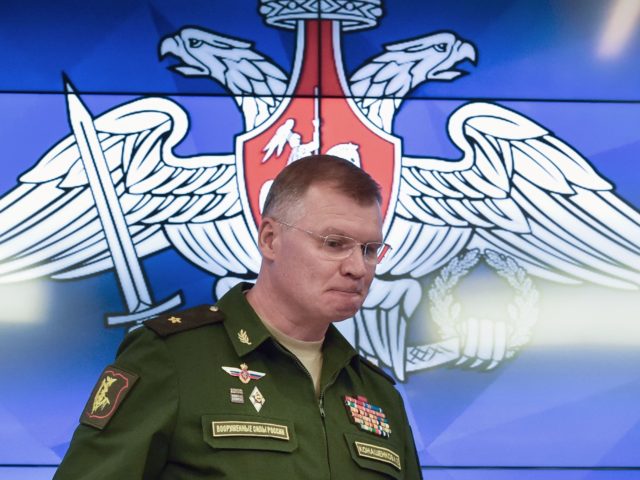 Russia's defence ministry spokesman Maj. Gen. Igor Konashenkov enters a press briefin