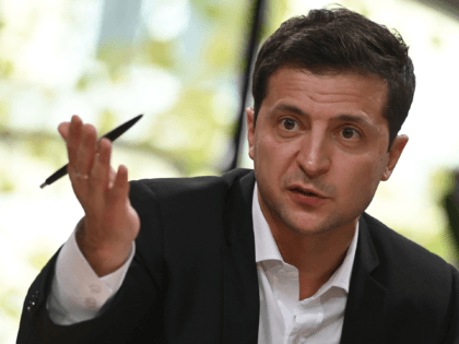 Ukrainian President Volodymyr Zelensky speaks to media during his day-long media marathon at the Kiev's food court on October 10, 2019. - Ukrainian President Volodymyr Zelensky said on October 10, 2019, a summit with Russian President would not take place if Kiev and separatist forces failed to pull back troops …