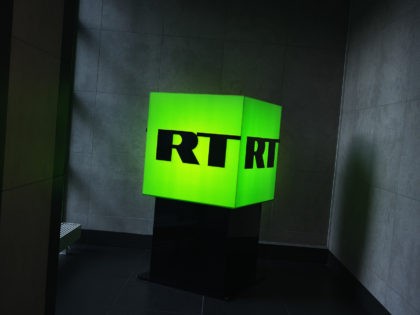 MOSCOW, RUSSIA - DECEMBER 06: (EDITORS NOTE: Image has been reviewed by RT prior to transmission.) The RT logo displayed in its office on December 6, 2019 in Moscow, Russia. RT, formerly known as Russia Today, is a state-funded TV network that produces news content in English and several other …