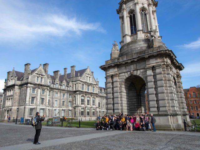 A group have their photograph taken at Trinity College Dublin on March 12, 2020. - Ireland