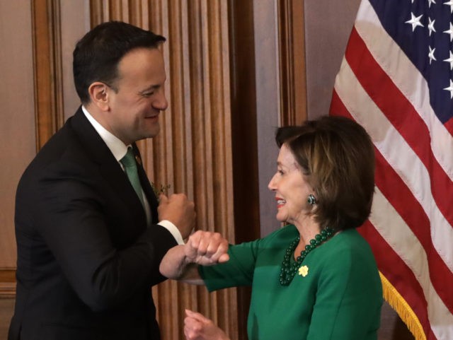 WASHINGTON, DC - MARCH 12: U.S. Speaker of the House Rep. Nancy Pelosi (D-CA) and Irish Taoiseach Leo Varadkar elbow-bump each other during the annual Friends of Ireland luncheon at the Rayburn Room of U.S. Capitol March 12, 2020 in Washington, DC. The Congressional Friends of Ireland hosted the annual …