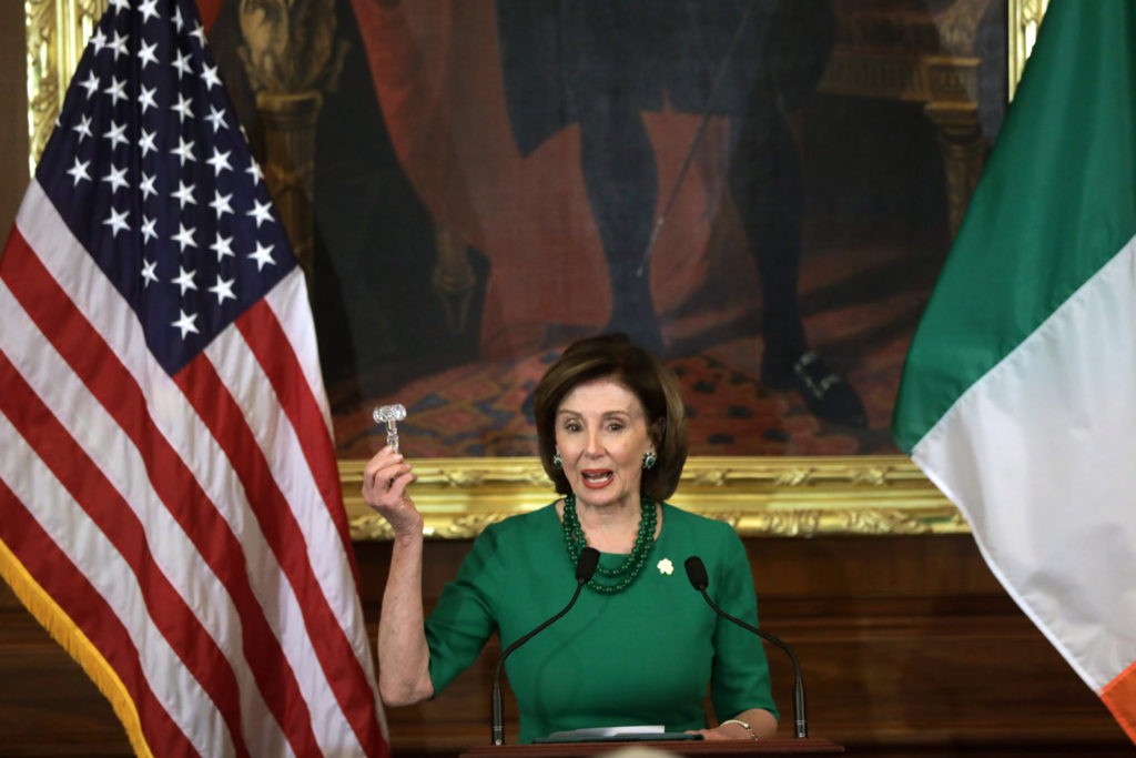 WASHINGTON, DC - MARCH 12: U.S. Speaker of the House Rep. Nancy Pelosi (D-CA) holds up a crystal gavel during the annual Friends of Ireland luncheon at the Rayburn Room of U.S. Capitol March 12, 2020 in Washington, DC. The Congressional Friends of Ireland hosted the annual luncheon to mark St. Patrick’s Day. (Photo by Alex Wong/Getty Images)