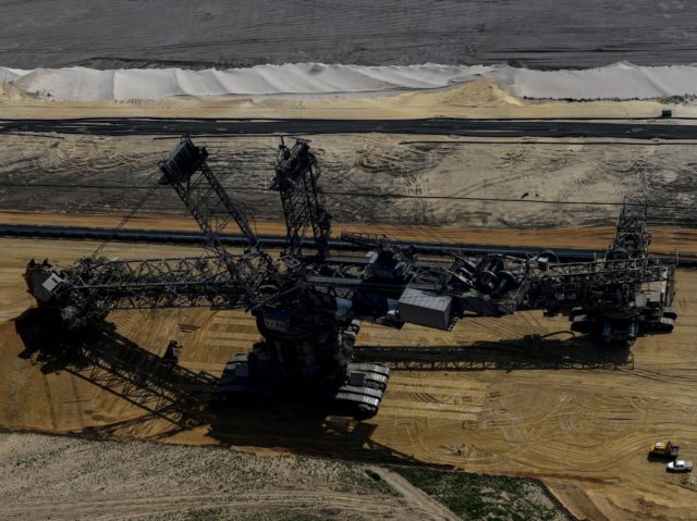 The aerial view taken on May 8, 2020 shows a bucket wheel excavator of German energy giant RWE at the Garzweiler opencast lignite coal mine in Juechen, western Germany. (Photo by Ina FASSBENDER / AFP) (Photo by INA FASSBENDER/AFP via Getty Images)