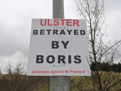 LARNE, NORTHERN IRELAND - MARCH 04: A poster erected by Unionists against NI Protocol can be seen near Larne harbour on March 4, 2021 in Larne, Northern Ireland. The Loyalist Communities Council (LCC) has written to Prime Minister Boris Johnson to inform him that they are temporarily withdrawing their support …