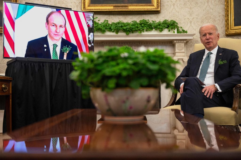 US President Joe Biden hosts Irish Prime Minister Micheál Martin (L on screen) during a virtual bilateral meeting for St. Patrick's Day at the White House in Washington, DC, on March 17, 2021. (Photo by JIM WATSON / AFP) (Photo by JIM WATSON/AFP via Getty Images)