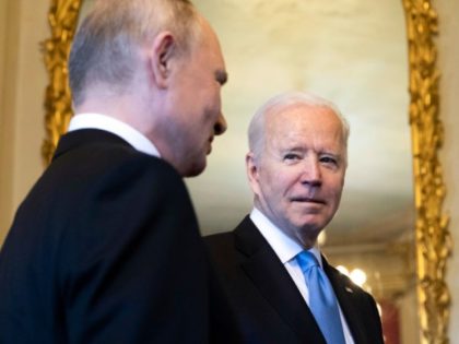 U.S. President Joe Biden (R) and Russian President Vladimir Putin meet during the U.S.-Rus