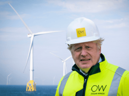 Britain's Prime Minister Boris Johnson gestures onboard the Esvagt Alba during a visit to the Moray Offshore Windfarm East, off the Aberdeenshire coast on August 5, 2021, the second day of his two-day visit to Scotland. (Photo by Jane Barlow / POOL / AFP) (Photo by JANE BARLOW/POOL/AFP via Getty …