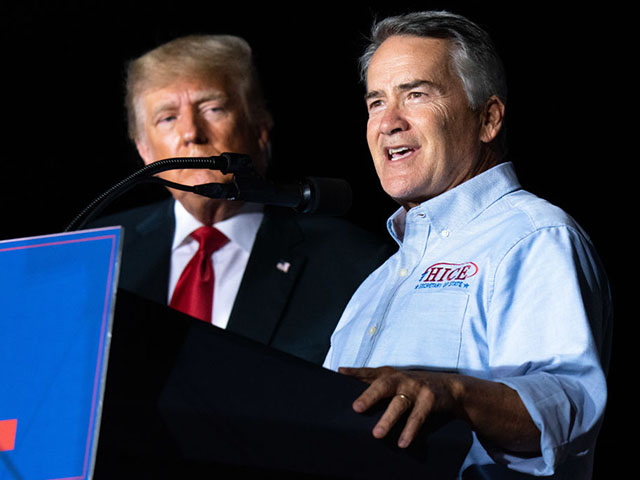 PERRY, GA - SEPTEMBER 25: Georgia Secretary of State candidate Rep. Jody Hice (R-GA) speaks to the crowd during a rally as former US President Donald Trump watches on September 25, 2021 in Perry, Georgia. Republican Senate candidate Herschel Walker and Georgia Lieutenant Gubernatorial candidate State Sen. Burt Jones (R-GA) also appeared as guests at the rally. (Photo by Sean Rayford/Getty Images)