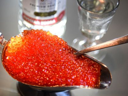 Salmon fish eggs, also known as red caviar in Russia, are pictured in Moscow on November 22, 2021. - Russians looking to indulge in their traditional winter holiday treat of red caviar will be disappointed this year, after the state statistics agency said Monday that prices hit historic highs. With …