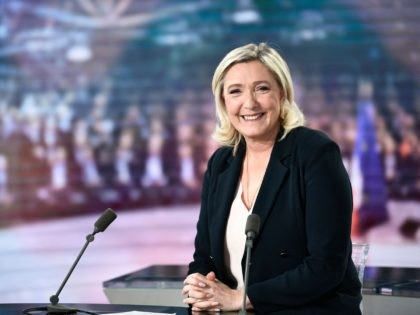 France's far-right party Rassemblement National (RN) candidate for the 2022 French presidential election Marine Le Pen poses prior to the political TV show "Partie de Campagne" in the new TV set of French TV channel TF1, in Boulogne-Billancourt, outside Paris, on January 16, 2022. (Photo by STEPHANE DE SAKUTIN / …