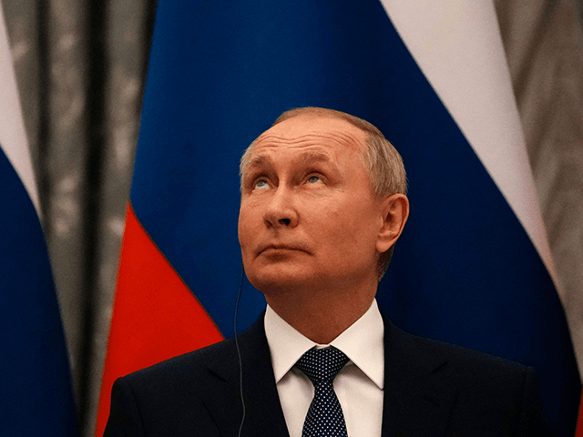 Russian President Vladimir Putin looks on during a press conference after meeting with French President in Moscow, on February 7, 2022. - International efforts to defuse the standoff over Ukraine intensified with French President holding talks in Moscow and German Chancellor in Washington to coordinate policies as fears of a …