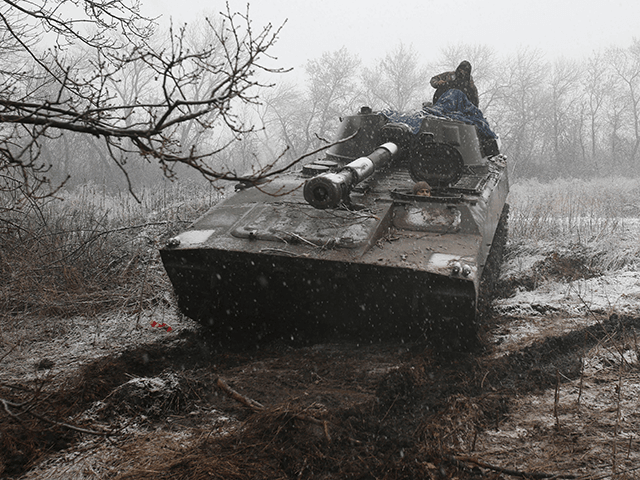 Ukrainian artillerymen keep position in the Luhansk region on March 2, 2022. (Photo by Ana