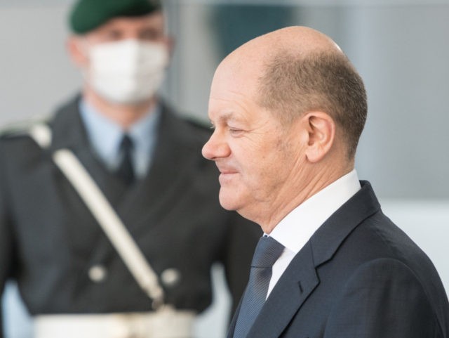 BERLIN, GERMANY - MARCH 09: German Chancellor Olaf Scholz waits for Canadian Prime Minister Justin Trudeau for talks at the Chancellery on March 9, 2022 in Berlin, Germany. Trudeau is currently on a trip to several countries across Europe to discuss the ongoing war in Ukraine with Canada's allies. (Photo …