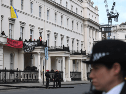 LONDON, ENGLAND - MARCH 14:(EDITORS NOTE: image contains profanity.) Police officers in riot gear arrive as protesters occupy a building reported to belong to Russian oligarch Oleg Deripsaka on March 14, 2022 in London, England. Overnight, protesters broke into 5 Belgrave Square, which reportedly belongs to the family of Oleg …
