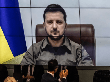 BERLIN, GERMANY - MARCH 17: Ukrainian President Volodymyr Zelensky addresses the Bundestag via live video from the embattled city of Kyiv on March 17, 2022 in Berlin, Germany. Zelensky has been pleading NATO member states to enforce a no-fly zone over Ukraine, which NATO has so far declined, citing the …