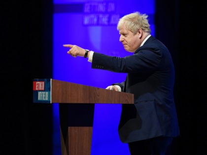 BLACKPOOL, ENGLAND – MARCH 19: British Prime Minister Boris Johnson addresses delegates during the Conservative Party Spring Conference at Blackpool Winter Gardens on March 19, 2022 in Blackpool, England. (Photo by Ian Forsyth/Getty Images)