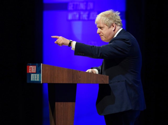 BLACKPOOL, ENGLAND – MARCH 19: British Prime Minister Boris Johnson addresses delegates