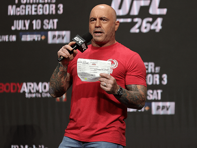 UFC commentator Joe Rogan announces the fighters during a ceremonial weigh in for UFC 264 at T-Mobile Arena on July 09, 2021 in Las Vegas, Nevada. (Photo by Stacy Revere/Getty Images)