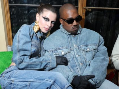 (L to R) Julia Fox and Ye attend the Kenzo Fall/Winter 2022/2023 show as part of Paris Fashion Week on January 23, 2022 in Paris, France. (Photo by Victor Boyko/Getty Images For Kenzo)