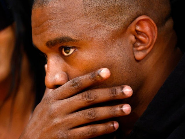 Rapper Kanye West attends a game between the Washington Wizards and the Los Angeles Lakers