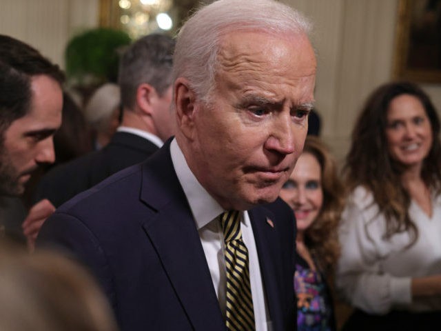 WASHINGTON, DC - MARCH 16: U.S. President Joe Biden leaves after an event to mark the reauthorization of the Violence Against Women Act at the East Room of the White House on March 16, 2022 in Washington, DC. President Biden, who helped to write the original piece of the legislation …