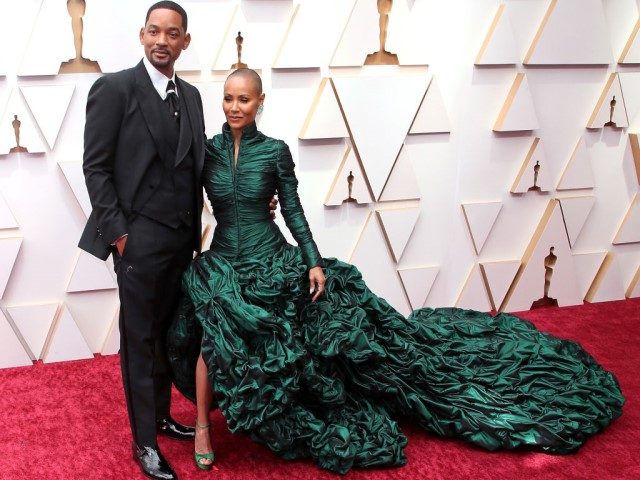 HOLLYWOOD, CALIFORNIA - MARCH 27: Will Smith and Jada Pinkett Smith attend the 94th Annual